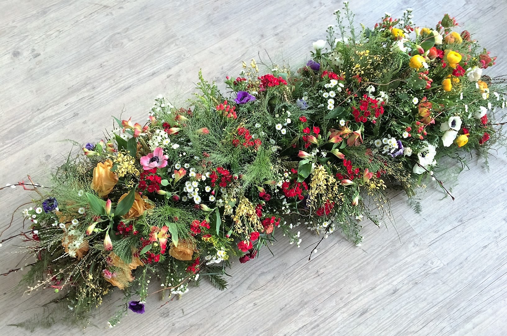 Coussins et couronnes pour cérémonies d'obsèques personnalisées